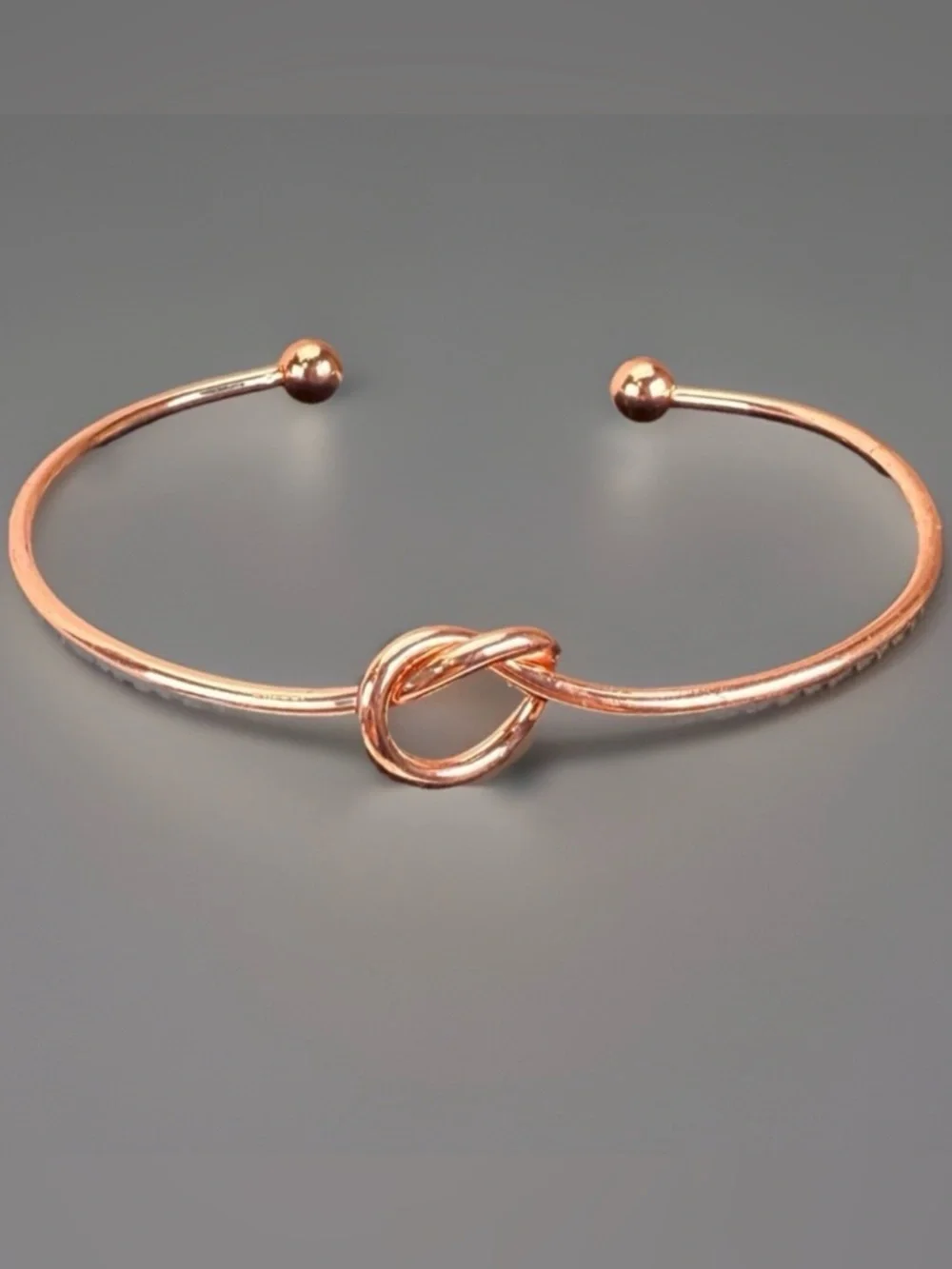 Pretty rose goldtone knotted minimalist cuff bracelet